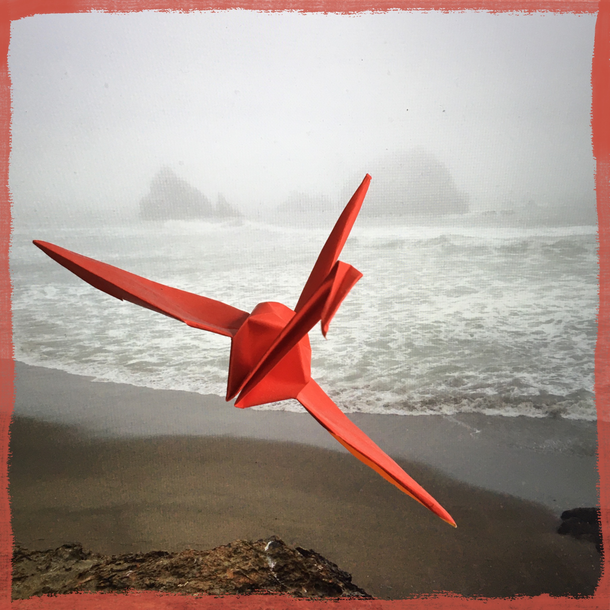 Red Paper Bird on Foggy Sea